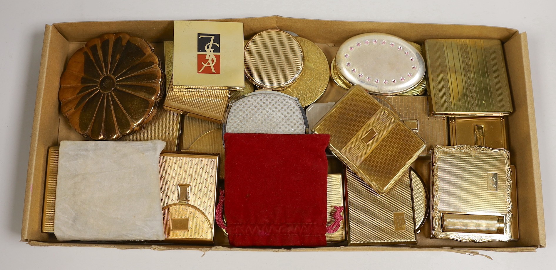 A collection of ladies compacts mostly from 1950’s and later: Coty, YSL, Swarovski, etc